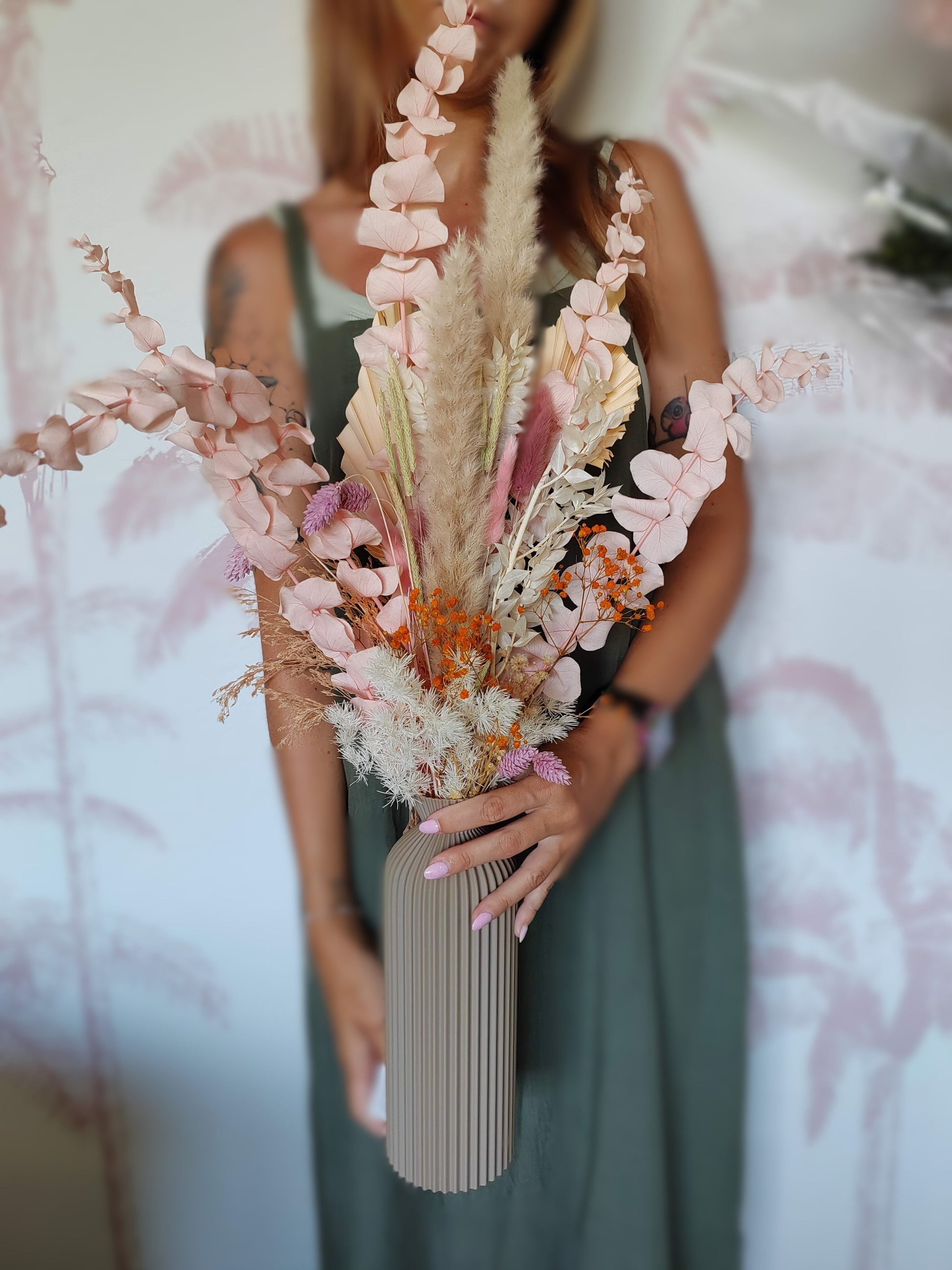 girl with dry flower vase