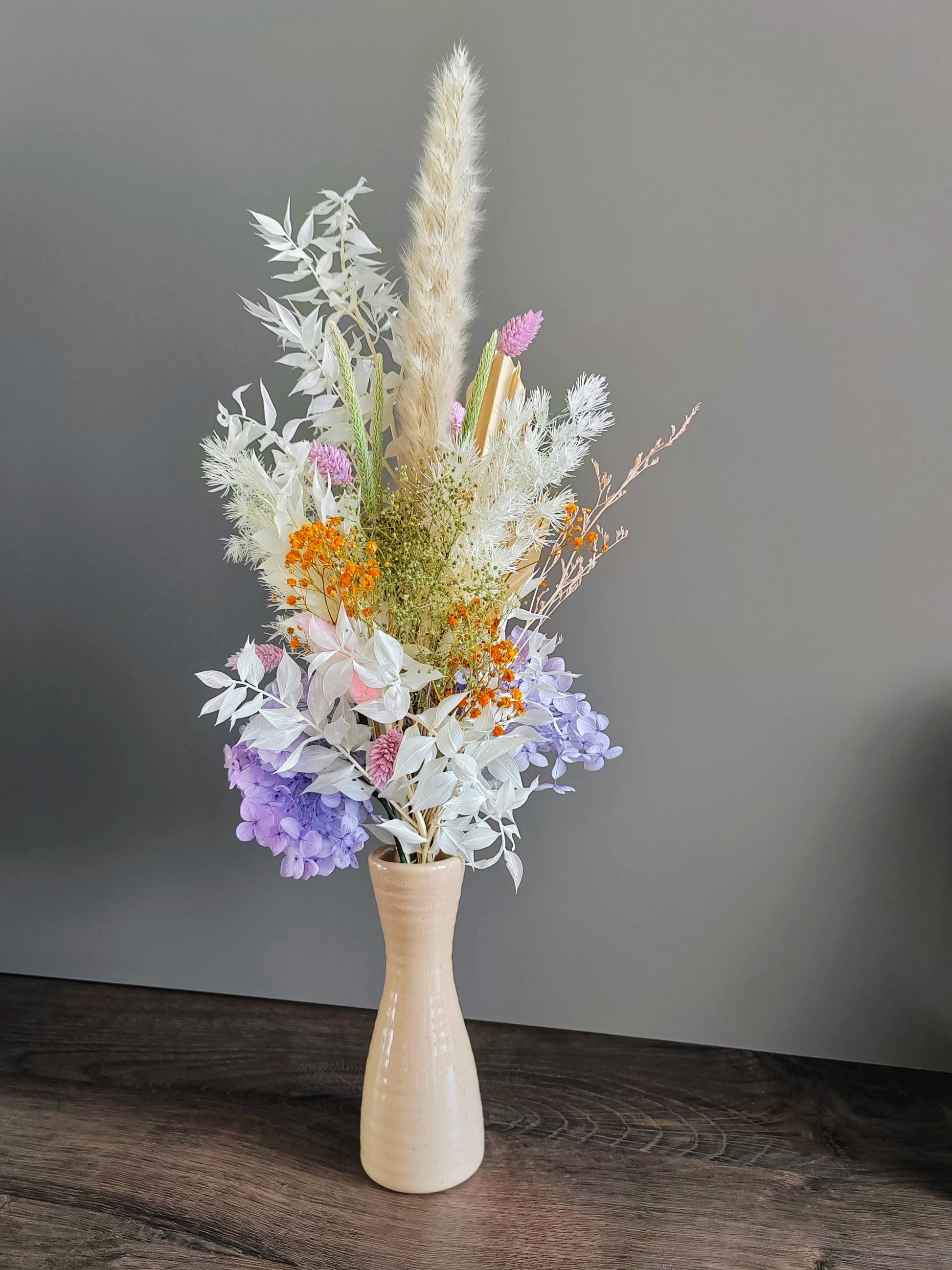 Flores secas pastel lila naranja
